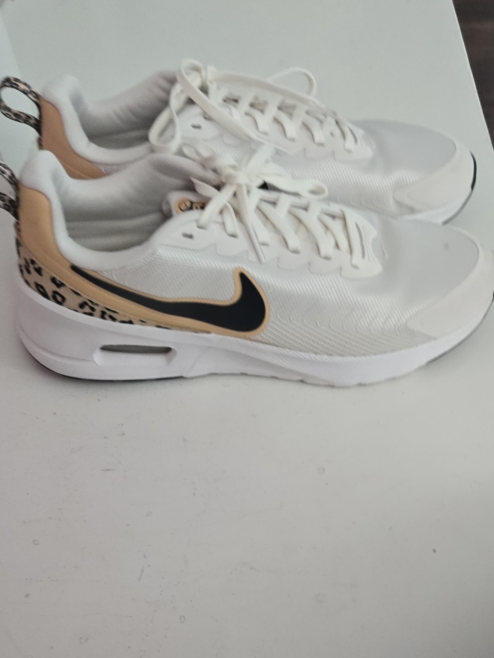 Nike Women’s White Sneakers with Tan Leopard and Black Swoosh